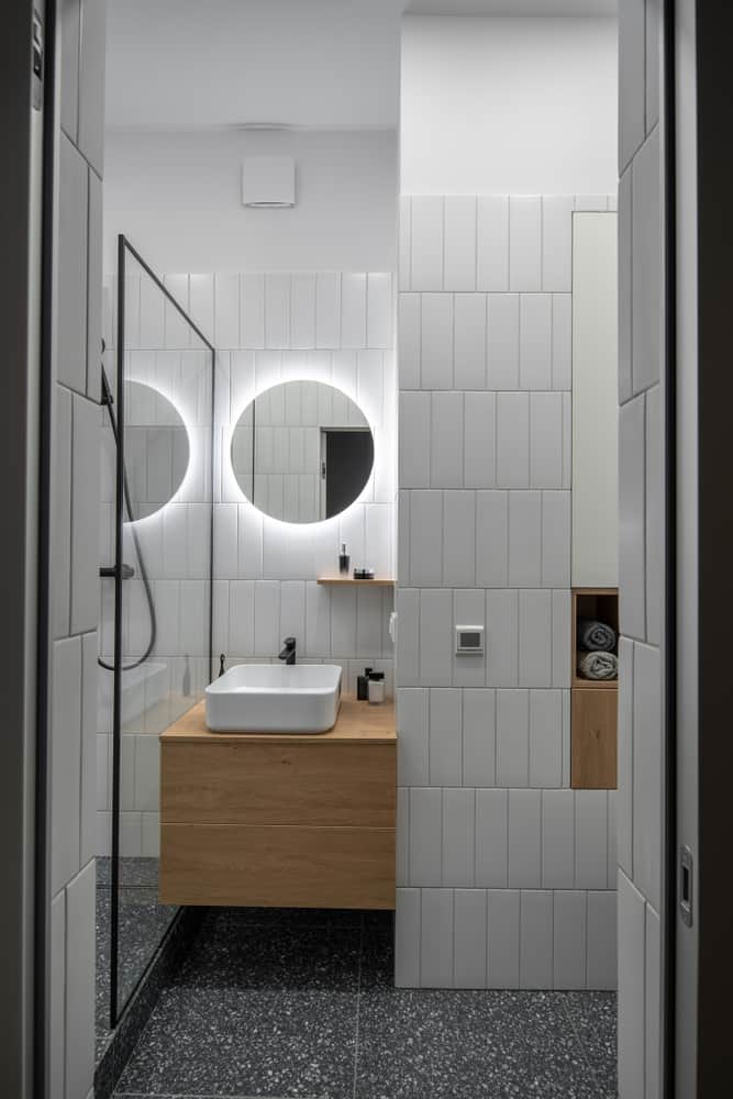 minimalist white tile small master bathroom with mirror with led lights