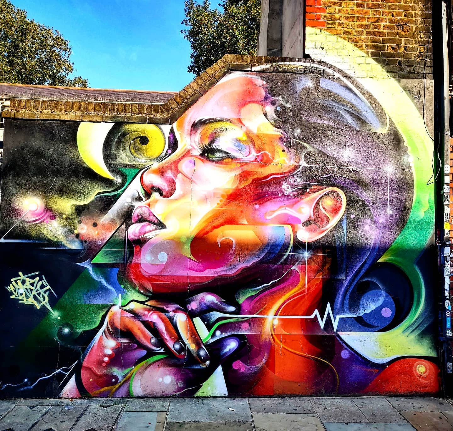 colorful spray painted image of a woman 