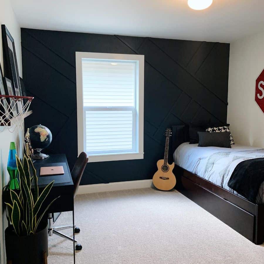 simple bedroom under bed storage guitar