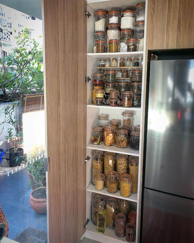 kitchen cabinet with glass jars