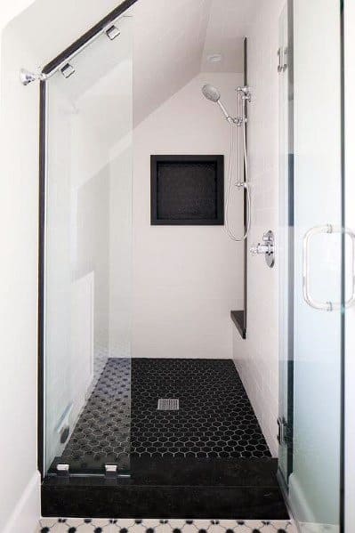 minimalist small master bathroom with black tile shower floor 