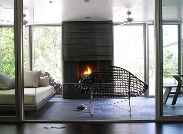 luxury sunroom platform couch fireplace 