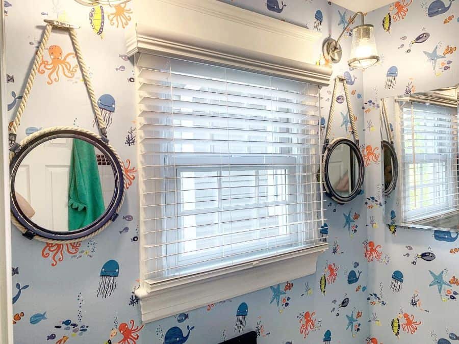 ocean theme bathroom porthole mirrors sea creatures wallpaper 
