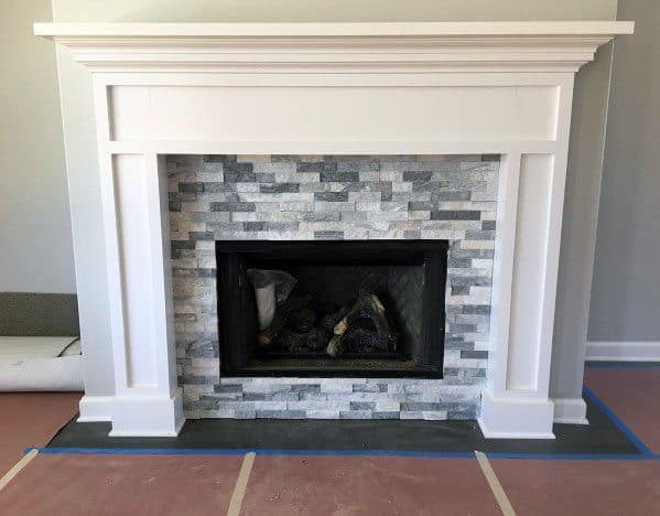 textured stone fireplace tiles