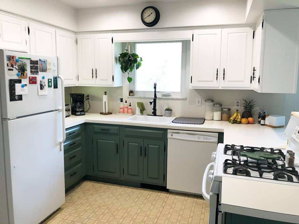 small u-shape kitchen with green and white cabinets 