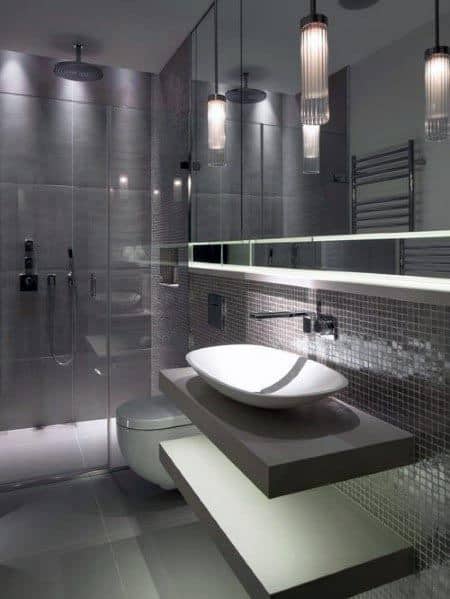 contemporary small master bathroom with gray tiles and glass shower 