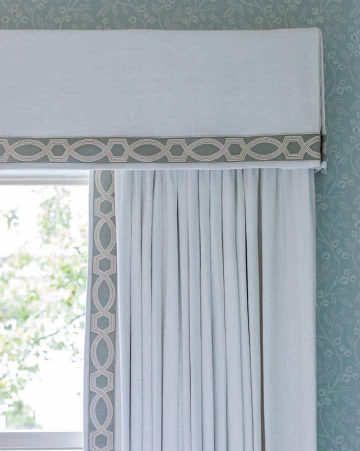 white valance cornice window treatment green pattern wallpaper