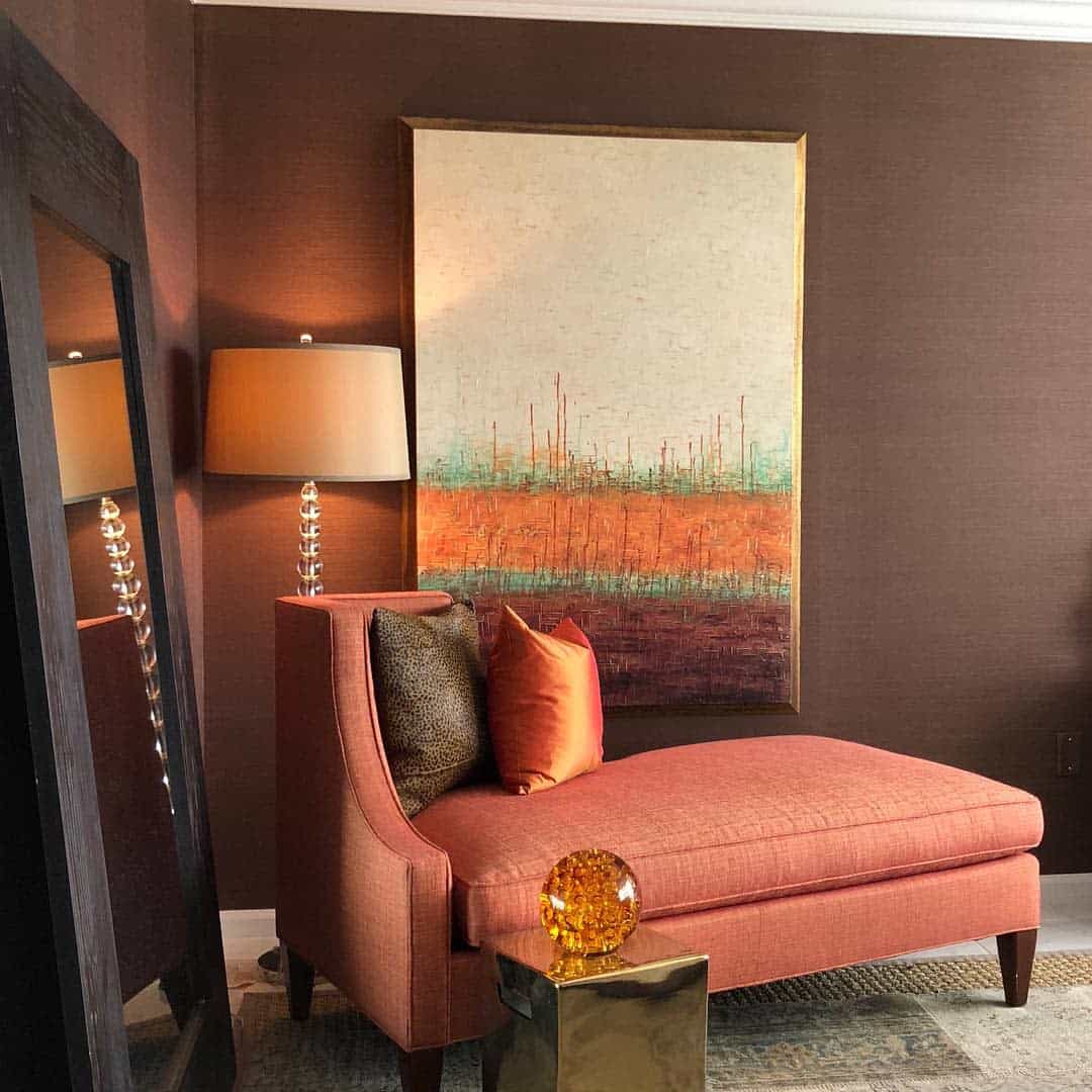 intimate living room red sofa tall mirror artwork