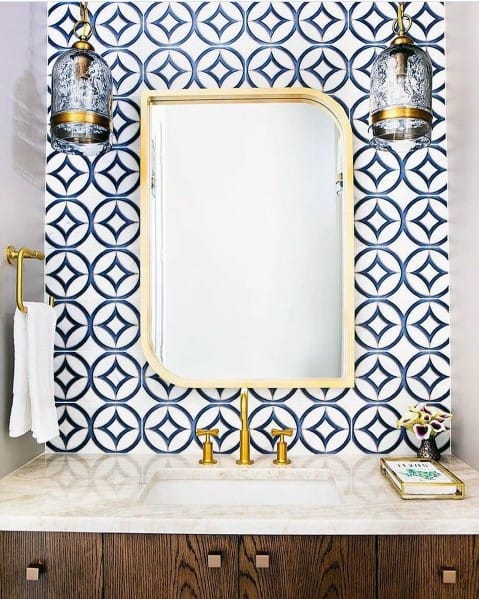 blue tiles gold features bathroom