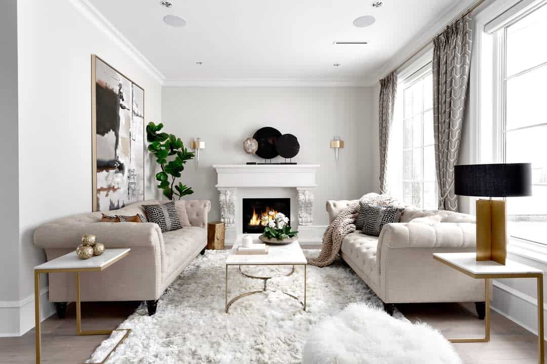 vintage living room white fireplace gray sofas floor rug