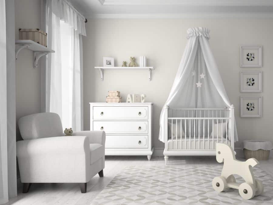 white nursery with toy horse