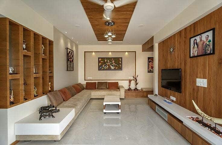modern lounge wood accents gray couch marble floor
